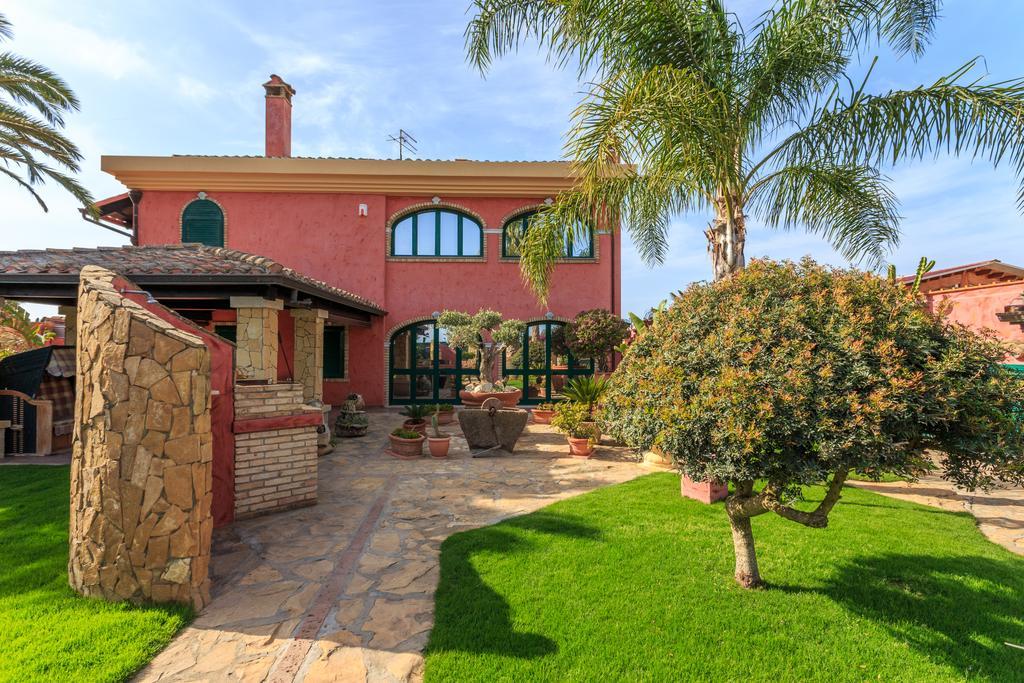Casa Vacanze Villa Flumini ฟลูมินิ ดิ กวาร์ตู ภายนอก รูปภาพ